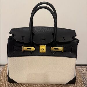 Elegant Black and Cream Women's Handbag